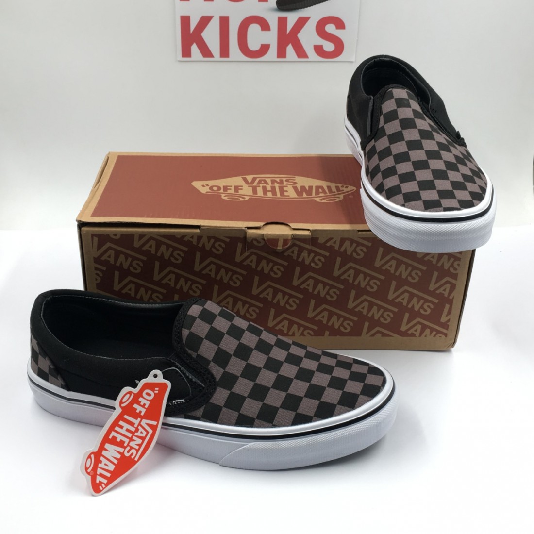 black and grey checkerboard vans lace up